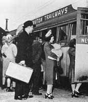 Kodama family boarding bus. Collection of Visual Communications (NRC.1998.232.1).